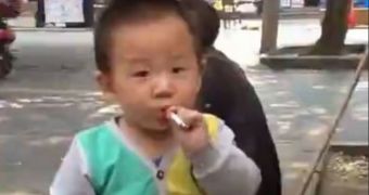 Toddler was filmed smoking a cigarette in the streets of China
