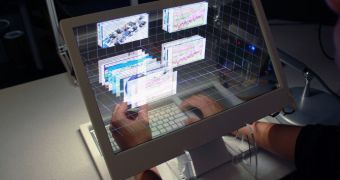 Touch and Move 3D Objects on This Transparent Hologram Computer – Video