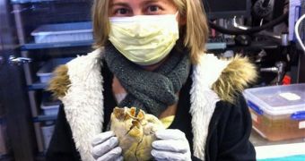 Penny holds her heart after her transplant