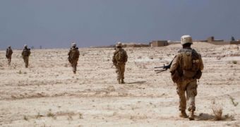 Two officers in the U.S. Marine have been charged over a video of them urinating over Afghan insurgents' bodies