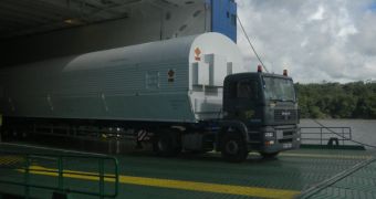 Soyuz ST-B rockets and Fregat-MT upper stages unloaded from Arianespace vessel MN Colibri, which arrived at Kourou harbor on June 18