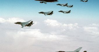 This is a pack of American Tomcats, refueling mid-flight from a tanker aircraft