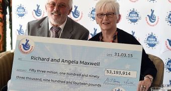 Richard and Angela Maxwell with the EuroMillions lottery check