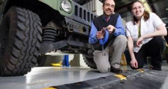 Douglas Adams, a Purdue associate professor of mechanical engineering, and graduate student Tiffany DiPetta are working to develop a technology that detects damage to critical suspension components in military vehicles, by simply driving over a speed bump
