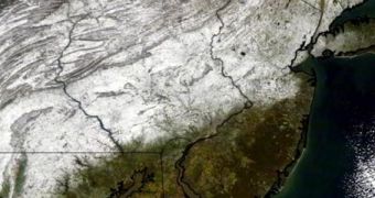 Satellite image showing the extent of snow covering the entire northeastern part of the United States
