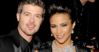 Paula Patton still can't make up her mind if she will divorce Robin Thicke