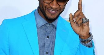 Usher says he's handsome and he wouldn't have it any other way