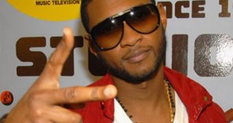 Usher says it’s his team that’s holding everything in place as he goes through divorce