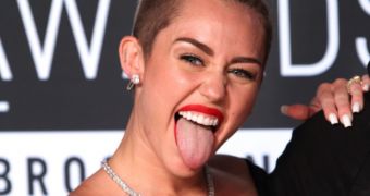 Miley Cyrus wants you to know her father approves of her VMAs 2013 performance