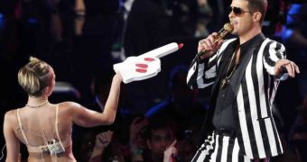 Miley Cyrus and Robin Thicke perform “Blurred Lines” at the MTV VMAs 2013