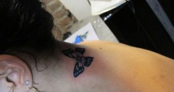 Vanessa Hudgens got a butterfly tattoo on the back of her neck