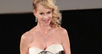 Melanie Griffith steps out without her signature tattoo, having covered it up completely