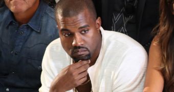 Kanye West is going to settle his assault case out of court