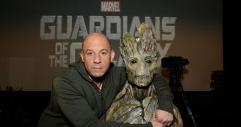 Vin Diesel takes a photo with his "Guardians of the Galaxy" character, Groot