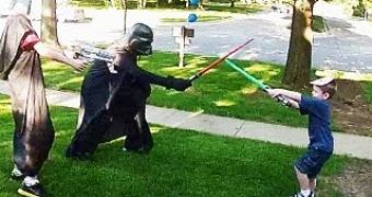 A U.S. Navy Sailor dresses up like Darth Vader to surprise his son