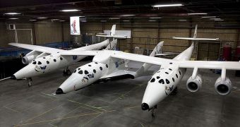 Image showing the SpaceShipTwo attached underneath the WhiteKnightTwo, at the space system's official dedication