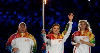 Putin's rumored lover, Alina Kabaeva, is the final torch bearer in the 2014 Sochi Olympics