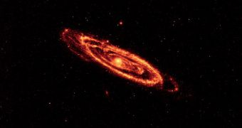 WISE image showing the the dust that speckles the Andromeda galaxy's spiral arms