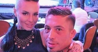 Christy Mack says she and War Machine broke up in May, here she is with him on July 27