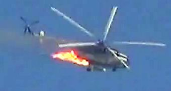 Syrian military helicopter crashes in flames, shot by rebels