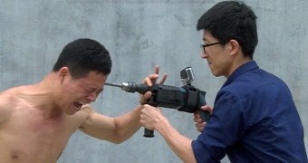 Watch: Kung Fu Master Takes Drill to the Head, Survives