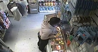 Video shows man using a banana to rob store