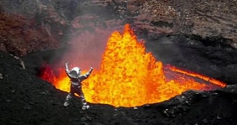 Video shows man standing on the edge of a lava lake