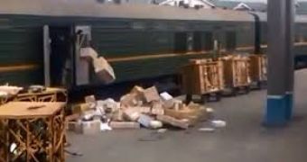 Postal workers unload train