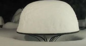 Watch: Time-Lapse Video Shows Blizzard Nemo Covering Patio Table with Snow