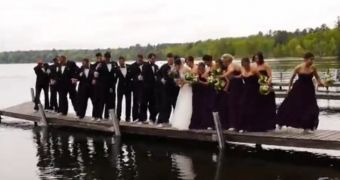 Wedding party ends up in a lake after wooden pier gives way