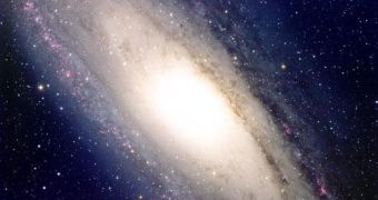 Astronomers estimate the mass of the supermassive black hole in the center of Andromeda's galactic nucleus at about 200 million times that of the Sun. The galaxy itself has an arm outstretch of about 7 degrees