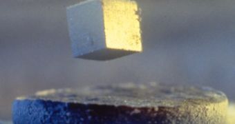 Effect of superconductivity: a block of material levitating in a magnetic field