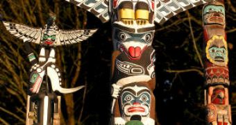 Totem poles with bald eagles in Vancouver