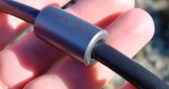 Image of a ferrite choke cyllinder before the application of the plastic case