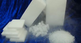 Dry ice is a white solid that breaks down in Earth's atmosphere through sublimation