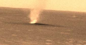 A dust devil on Mars photographed by the Spirit rover on Sol 486 (the 486th day of the Martian year)
