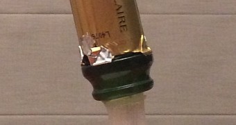 Wine Bottle-Turned-Lamp Is Held Up by Spurting Drink