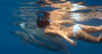 28-year-old woman is best friends with dolphins