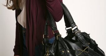Oversized handbags are becoming redundant as weight women carry around daily drops by 57 percent