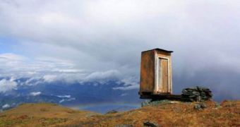 The extreme toilet is suspended on a cliff edge