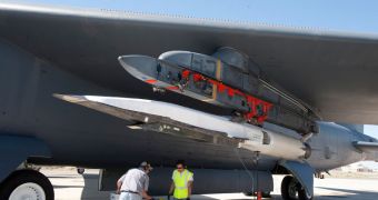 This image shows the X-51 Waverider attached under the wing of a B-52H Stratofortress long-range bomber