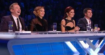 Simon Cowell sides with Cheryl Cole in feud against Louis Walsh and Dannii Minogue