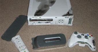 An Xbox 360, killing itself after the poll