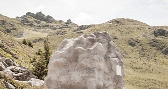 The boulder in this image is actually a cabin