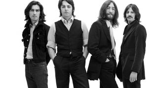'The Beatles. On iTunes' banner