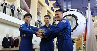NASA astronaut Kjell Lindgren, space explorer Oleg Kononenko of Roscosmos, and Kimiya Yui of JAXA