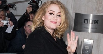 Adele outside the BBC studios, on the day leading single "Hello" was released