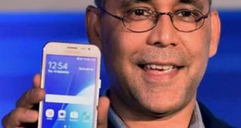 Director, mobile business, Samsung India, Manu Sharma showing the launch of the Samsung Galaxy J2