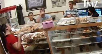 Ariana Grande in the now-famous donut shop in California, where she said she hated Americans, so she licked and spit on donuts