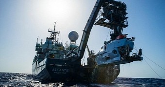 The research vessel Atlantis with the submersible Alvin hanging off its stern